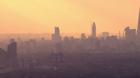 Aerial view of the London skyline on a hazy autumn morning Stock Footage