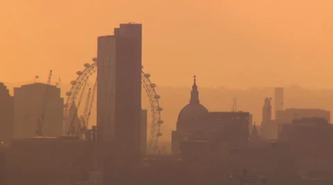 Aerial view of the London skyline on a hazy autumn morning Stock Footage