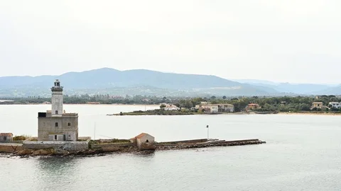 Aerial view of a lonely lighthouse on an islet, olbia Stockbeeldmateriaal 105791199