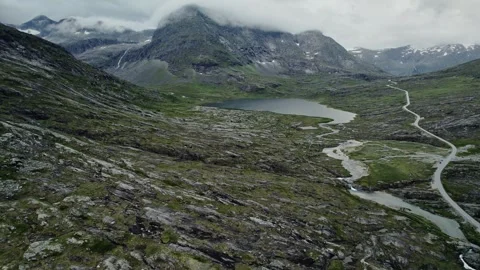 Aerial View of Lonely Road in Rugged Nordic Tundra, Norway Landscape Stock Footage 330131388