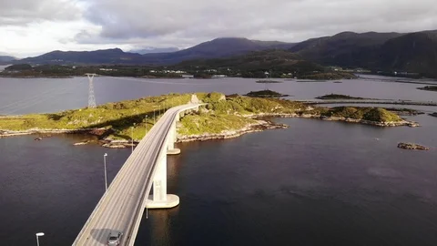 Aerial view of long bridge with moving vehicle during sunset Stock Footage 119073072