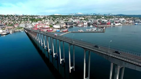 Aerial View of Long Bridge Spanning Coastal City and Waterway Stock Footage 308341074