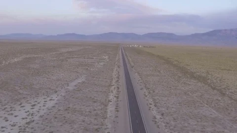 Aerial view of long desert road. Stock Footage 79863953