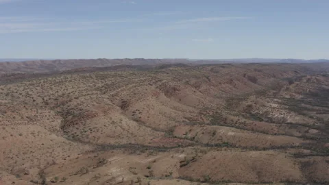 Aerial view of long, dry, dusty ridge and plateau Stock Footage 191015237
