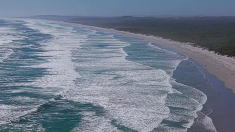 Aerial view of long empty coastline with ocean waves South Africa Stock Footage 331194075