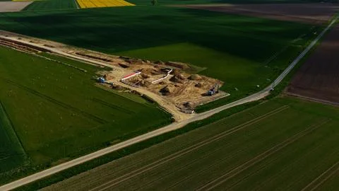 Aerial View of Long Infrastructure Construction Trench Through Agricultural Фото