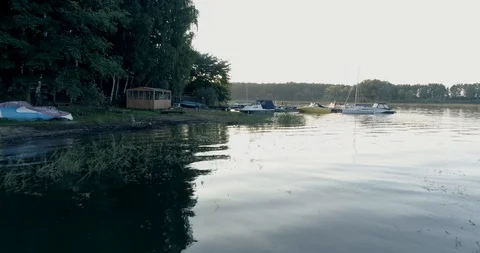 Aerial view. Long movement. Low flight. Boat station on a sunny day. Video stock 94928061