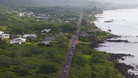 Aerial view of a long queue of cars, during tsunami evacuation in Hawaii, USA Stock Footage 319009043