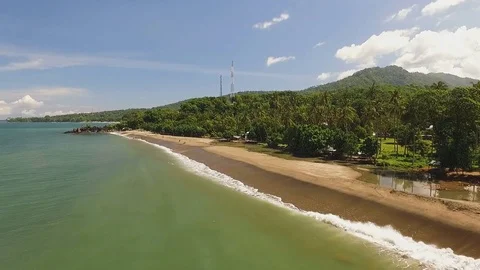 Aerial view of a long sandy beach in Lombok, Indonesia, circle around Stock Footage 78715914