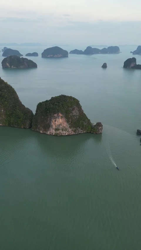 Aerial View of Long Tail Boat Sailing in Phang Nga, Thailand Stock Footage 335251192