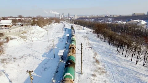 Aerial view of long train. Winter. Snow. Stock Footage 59635409
