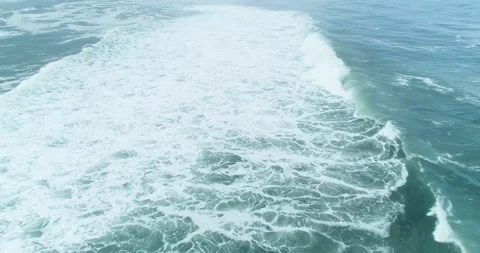 Aerial view of long wave breaking the concept of surfing Stock Footage 324592268