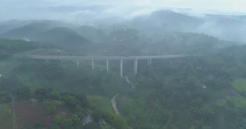 Aerial View of The Longest Active Train Bridge Cikubang and Cipularang Toll Road Stock Footage 131091556