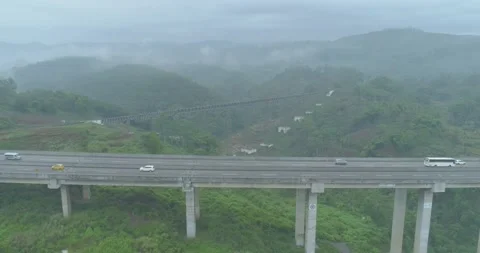 Aerial View of The Longest Active Train Bridge Cikubang and Cipularang Toll Road Stock Footage 131094334