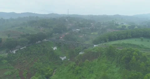 Aerial View of The Longest Active Train Bridge Cikubang and Cipularang Toll Road Stock Footage 131094959