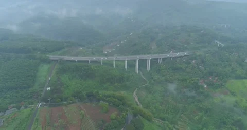 Aerial View of The Longest Active Train Bridge Cikubang and Cipularang Toll Road Stock Footage 131095063