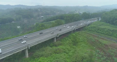 Aerial View of The Longest Active Train Bridge Cikubang and Cipularang Toll Road Stock Footage 131095982