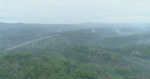 Aerial View of The Longest Active Train Bridge Cikubang and Cipularang Toll Road Stock Footage 131096153