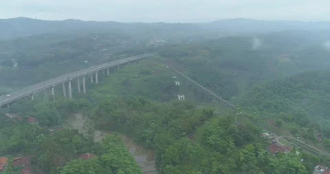 Aerial View of The Longest Active Train Bridge Cikubang and Cipularang Toll Road Stock Footage 131097119
