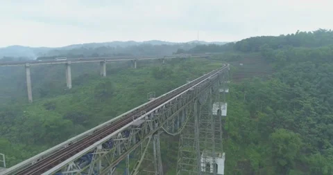 Aerial View of The Longest Active Train Bridge Cikubang and Cipularang Toll Road Stock Footage 131097426