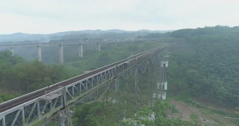 Aerial View of The Longest Active Train Bridge Cikubang and Cipularang Toll Road Stock Footage 131099552