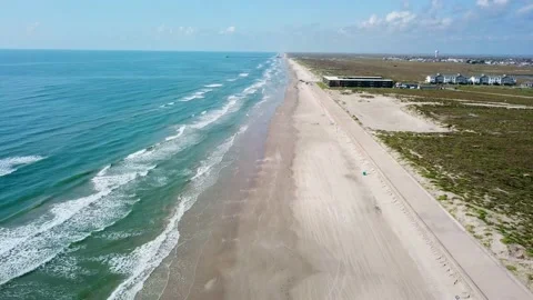 Aerial view looking back along the shoreline at Padre Island, Texas, 4K Stock Footage 158575246