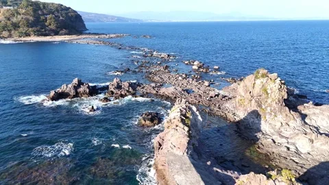 Aerial View Looking Back at Manazuru Peninsula from Rocks Stock Footage 329059533