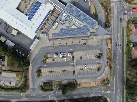 Aerial view looking directly down on a modern building and road 스톡 사진