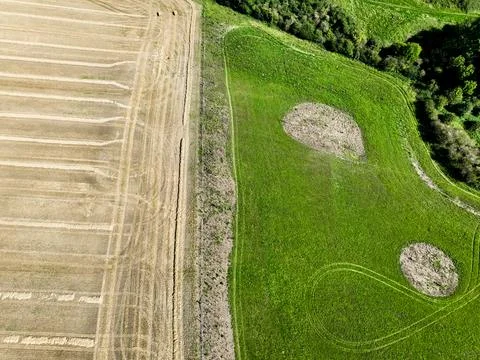 Aerial view looking directly down on a arable field Stock Photos