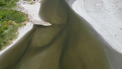 Aerial view looking down to clear water of river from national park. ID0194 Stock Footage 235743949
