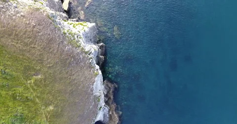 Aerial view looking down onto cliffs Stock Footage
