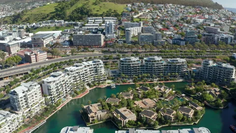 Aerial view looking down at the concrete island and buildings surrounding it Stock Footage 169887220