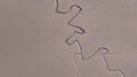 Aerial view looking down at Maldon saltmarsh thunderbolt texture in Essex low Stock Footage 320891269