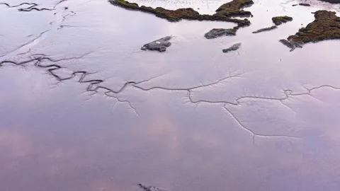 Aerial view looking down at Maldon saltmarsh thunderbolt texture in Essex low Stock Footage 320919741