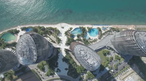 Aerial view looking down on the modern Phoenix hotel resort complex China Video stock 67528463