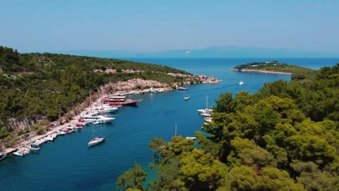 Aerial view looking down the natural sea channel of Gaios harbor toward the Stock Footage 341426615