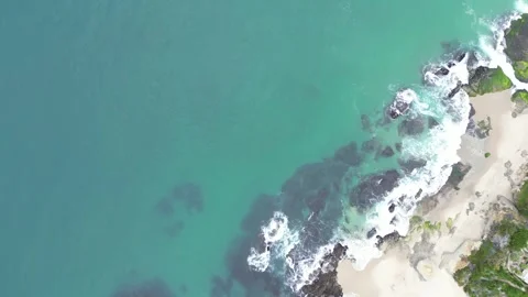 Aerial View Looking Down over Ocean Coast 動画素材 246409414