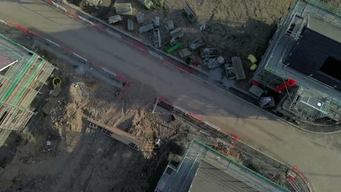 Aerial view looking down over British new home development construction site 库存影片 337898443