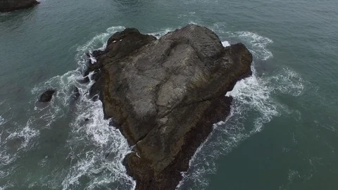 Aerial View Looking Down On Rock Formations in the Ocean Stock Footage 71162495