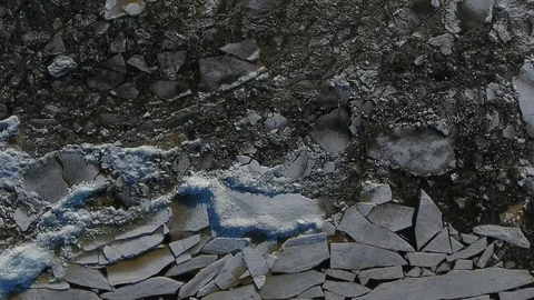 Aerial view looking down on volga river with frozen ice Stock Footage