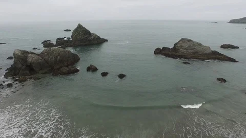 Aerial View Looking Of Rock Formations on Ocean Shore 스톡 동영상 71164012