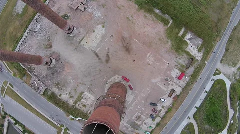 Aerial view looking straight down smokestack Stock Footage 49751591