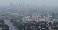 Aerial View of Los Angeles City Downtown Skyline Cars Traffic on Busy Highway 4k or 4k+ Resolution