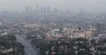Aerial View of Los Angeles City Downtown Skyline Cars Traffic on Busy LA Freeway 4k or 4k+ Resolution