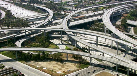 Aerial view of Los Angeles freeway intersection Stock Footage