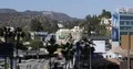 Aerial View of Los Angeles Hollywood Hills Sign Famous Landmark Cars Traffic Day 4k or 4k+ Resolution