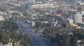 Aerial View of Los Angeles Skyline Capitol Records Building Highway Car Traffic HD Footage