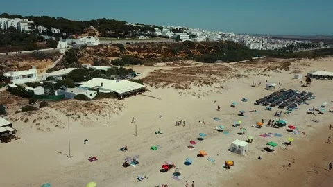 Aerial view of Los Bateles beach with people sunbathing under the hot sun Vidéo 155691530