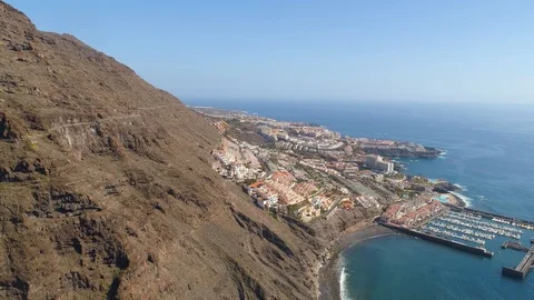 Aerial view of Los Gigantes Cliffs on Tenerife, drone shot from above, Canarias Stock Footage 97667331