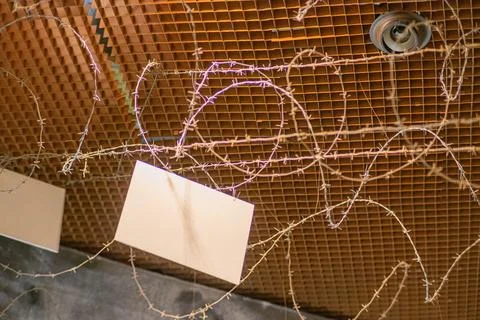 Aerial view from a low angle of a barbed wire installation with a complex p.. Stock Photos